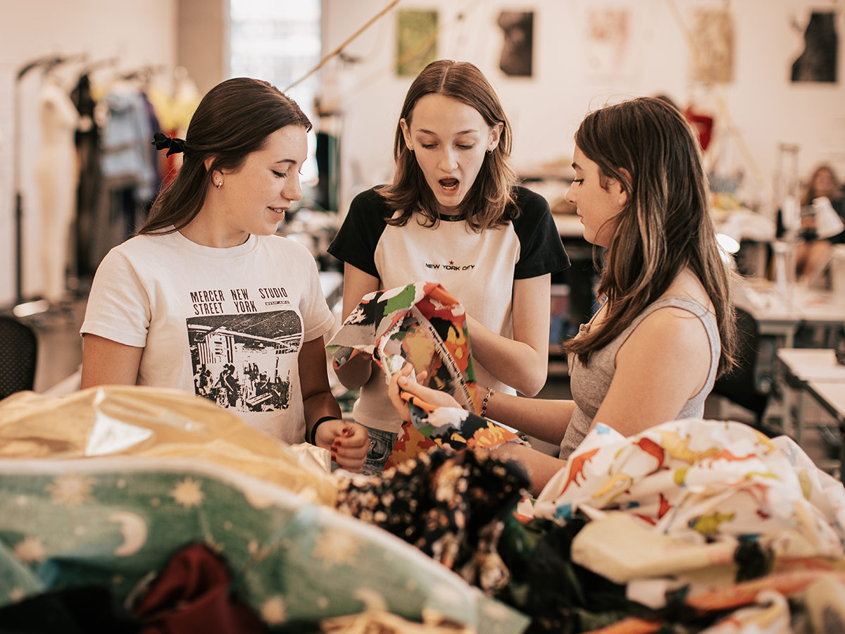 Students working together on fashion project